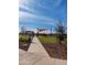 Community park offers a shaded picnic area, playground equipment, and lush green space for outdoor enjoyment at 9137 W Sells Dr, Phoenix, AZ 85037