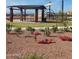 Community park offering a picnic table under a gazebo, and playground for outdoor recreation at 9137 W Sells Dr, Phoenix, AZ 85037