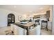 Dining room with a cabinet, natural light, and modern decor at 9530 W Avalon Dr, Phoenix, AZ 85037