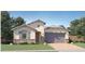 Charming single-story home with a two-car garage and stone accents at 9530 W Avalon Dr, Phoenix, AZ 85037