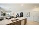 Open kitchen with sleek countertops and stainless steel dishwasher at 9530 W Avalon Dr, Phoenix, AZ 85037