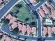 Aerial view of a residential neighborhood with well-maintained homes, green spaces, and a community pool at 1020 W Sunward Dr, Gilbert, AZ 85233
