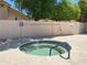 Inviting community hot tub with tiled accents, safety rails, and nearby signage for shallow water and rules at 1020 W Sunward Dr, Gilbert, AZ 85233