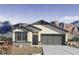 Charming single-story home featuring desert landscaping and a two-car garage at 10618 W Bloch Rd, Tolleson, AZ 85353