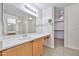 Bathroom with vanity, and walk-in closet at 11626 W Holly St, Avondale, AZ 85392