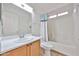Cozy bathroom with single sink vanity and bathtub with shower at 11626 W Holly St, Avondale, AZ 85392