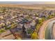 Expansive aerial view of a home in a desert community, featuring a spacious backyard at 12110 W Rowel Rd, Peoria, AZ 85383