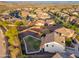 Property aerial view showcases a yard situated in a desert community at 12110 W Rowel Rd, Peoria, AZ 85383
