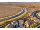 Beautiful aerial view of a two-story home located along a serene canal waterway at 12110 W Rowel Rd, Peoria, AZ 85383