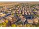Lovely aerial view showcasing the desert community, backyard space, and the neighborhood at 12110 W Rowel Rd, Peoria, AZ 85383