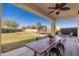 Beautiful backyard with a covered patio and a trampoline at 12110 W Rowel Rd, Peoria, AZ 85383