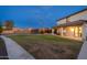 Lush backyard featuring a well-maintained lawn, perfect for outdoor activities and relaxation at 12110 W Rowel Rd, Peoria, AZ 85383