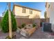 Private backyard featuring a gravel area, garden beds, and a well-maintained fence, offering a tranquil outdoor space at 12110 W Rowel Rd, Peoria, AZ 85383