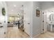 Open foyer showcasing tiled floors, natural light, and access to the living area at 12110 W Rowel Rd, Peoria, AZ 85383
