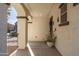 Inviting covered front porch featuring decorative accents, providing a welcoming entrance at 12110 W Rowel Rd, Peoria, AZ 85383