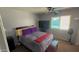 Cozy bedroom with a comfortable bed, a window for natural light, and space for relaxation at 15729 W Lundberg St, Surprise, AZ 85374