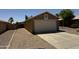 Charming single-story home with a well-maintained gravel front yard and a two-car garage, perfect for a Gathering at 15729 W Lundberg St, Surprise, AZ 85374