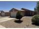Charming single-story home with a well-maintained front yard and a two-car garage, perfect for a Gathering at 15729 W Lundberg St, Surprise, AZ 85374