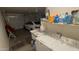 The garage is well-equipped with modern appliances, storage shelves, and room for parking at 15729 W Lundberg St, Surprise, AZ 85374