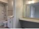 Updated bathroom with modern vanity, a large mirror, and shower-tub combo at 2155 W Farmdale Ave # 8, Mesa, AZ 85202