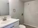 Bathroom with white vanity, gray flooring, and a modern faucet at 2155 W Farmdale Ave # 8, Mesa, AZ 85202
