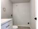 Bathroom with white vanity, gray flooring, and a modern faucet at 2155 W Farmdale Ave # 8, Mesa, AZ 85202