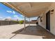 Covered patio and low maintenance backyard with a rock lawn at 2348 E Diamond Ave, Mesa, AZ 85204