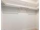 Walk-in closet features white shelving, offering ample storage at 2348 E Diamond Ave, Mesa, AZ 85204