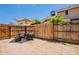 Private backyard with patio, umbrella, and seating area perfect for relaxation at 2455 E Broadway Rd # 115, Mesa, AZ 85204