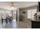 Dining room with table, chairs, and a sliding glass door to the patio at 2455 E Broadway Rd # 115, Mesa, AZ 85204