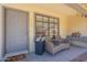 Welcoming front porch with seating, decor, and a cozy atmosphere at 2455 E Broadway Rd # 115, Mesa, AZ 85204
