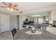Open concept kitchen area adjacent to the dining room, perfect for entertaining at 2455 E Broadway Rd # 115, Mesa, AZ 85204
