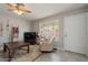 Cozy living room with tile floors, natural light, and a relaxing ambiance at 2455 E Broadway Rd # 115, Mesa, AZ 85204