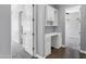 An efficient office nook with built-in cabinetry and shelving perfect for work or study at 24615 S 182Nd Pl, Gilbert, AZ 85298