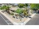 Aerial view of home featuring desert landscaping, tiled roof, pool and surrounding neighborhood at 28 E Winged Foot Rd, Phoenix, AZ 85022