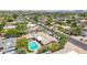 Charming aerial view of a home featuring a backyard pool and lush desert landscaping at 28 E Winged Foot Rd, Phoenix, AZ 85022