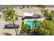 Aerial view of a private backyard pool and patio perfect for outdoor living and entertaining at 28 E Winged Foot Rd, Phoenix, AZ 85022