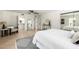 Bright bedroom with a neutral color palette, a mirrored closet and a walk-in closet at 28 E Winged Foot Rd, Phoenix, AZ 85022
