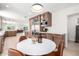 Bright, eat-in kitchen boasts stainless steel appliances, and wood cabinetry at 28 E Winged Foot Rd, Phoenix, AZ 85022