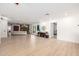 Open living area with hardwood floors, fireplace, and neutral decor at 28 E Winged Foot Rd, Phoenix, AZ 85022