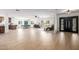 Open living area with light hardwood floors, neutral tones, and plenty of natural light at 28 E Winged Foot Rd, Phoenix, AZ 85022