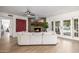 Comfortable living room with fireplace and view of the pool at 28 E Winged Foot Rd, Phoenix, AZ 85022