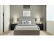 Calm bedroom featuring a soft color palette, a modern chandelier, and comfortable bedding at 3006 E Lucky Horseshoe Ln, San Tan Valley, AZ 85140