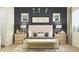 A stylish bedroom featuring neutral tones, modern lighting, and a cozy bench at the foot of the bed at 3006 E Lucky Horseshoe Ln, San Tan Valley, AZ 85140