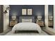 Inviting bedroom boasts baseball-themed decor, bedside tables, and neutral color scheme for a cozy retreat at 3006 E Lucky Horseshoe Ln, San Tan Valley, AZ 85140