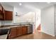 Kitchen with stainless steel appliances, wood cabinets, and an open concept design at 3085 E Camellia Dr, Gilbert, AZ 85296