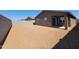 Expansive backyard with fresh dirt, awaiting personalized landscaping and outdoor enjoyment at 3529 E Audrey Dr, San Tan Valley, AZ 85143