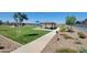 Community park with well-maintained grass, a shaded picnic area, and inviting landscaping at 3529 E Audrey Dr, San Tan Valley, AZ 85143