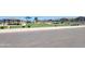 Scenic park view showcasing a playground, covered picnic areas, and lush green spaces at 3529 E Audrey Dr, San Tan Valley, AZ 85143