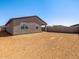 Expansive backyard with block fencing offers a blank canvas for your outdoor dreams at 3557 E Audrey Dr, San Tan Valley, AZ 85143